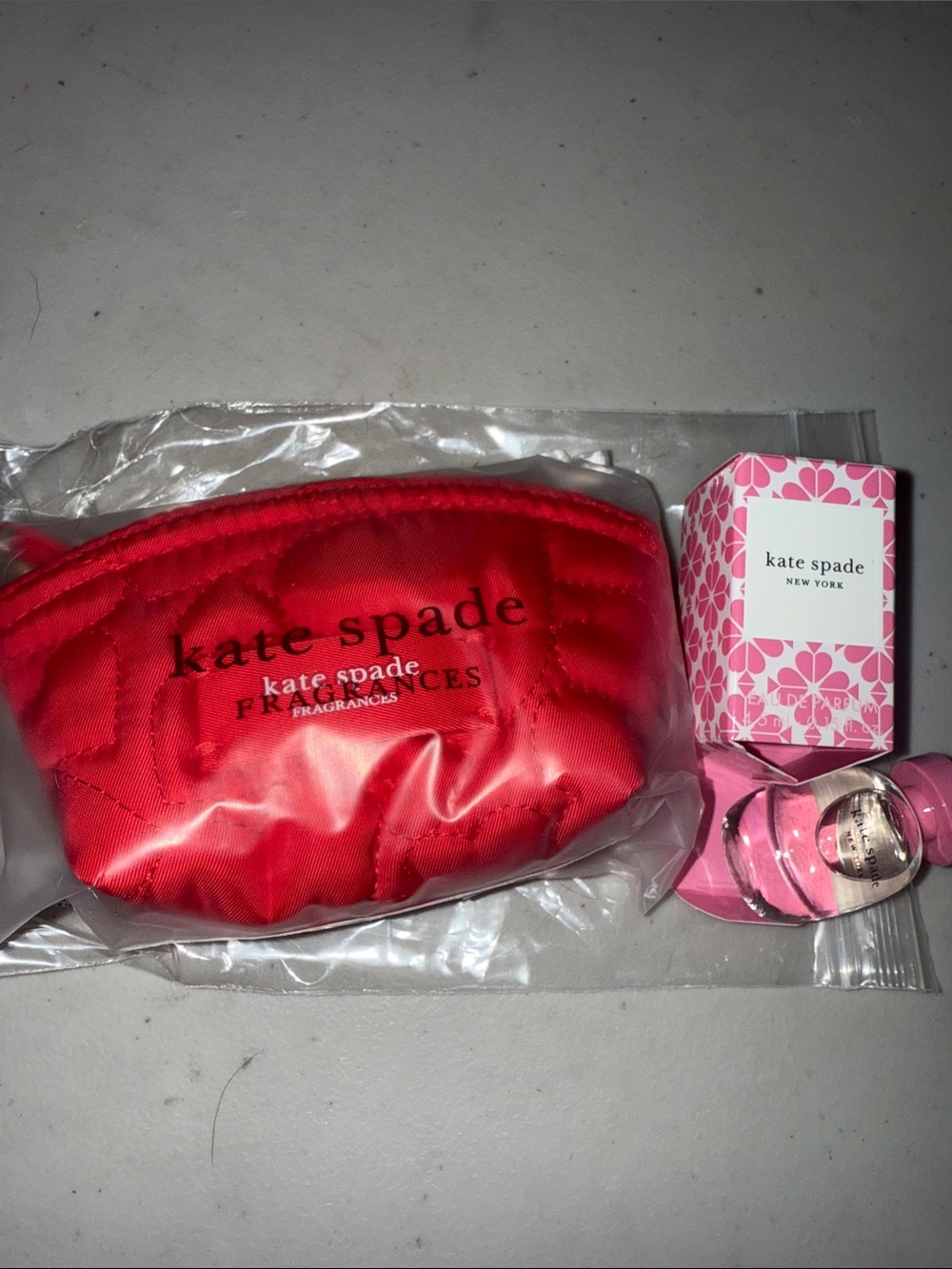 kate spade Red Quilted Cosmetic Pouch with mini parfum